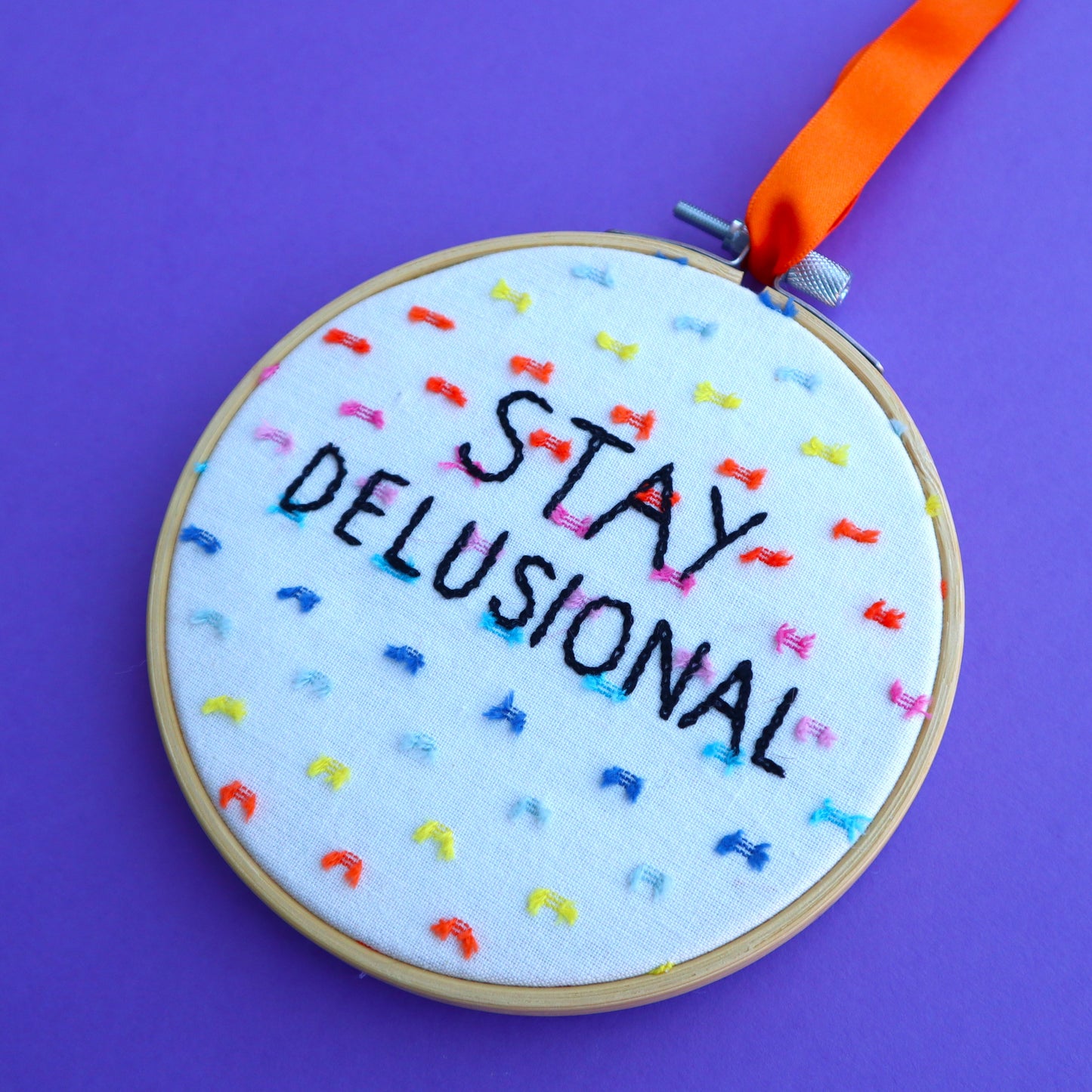 'Stay Delusional' Embroidered Hoop
