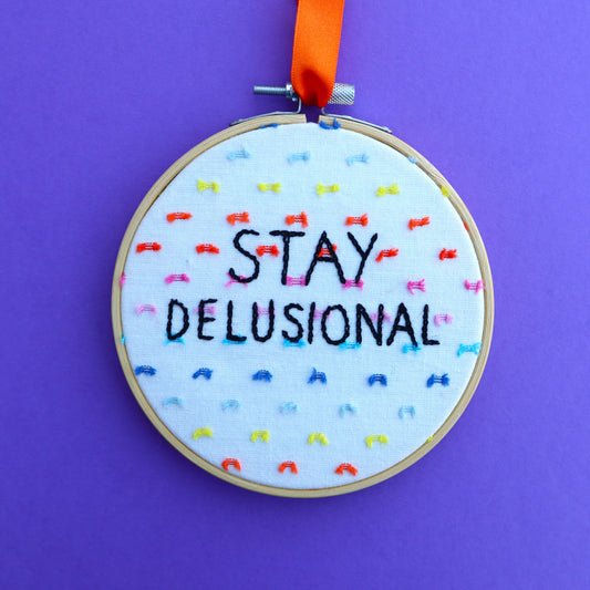 'Stay Delusional' Embroidered Hoop